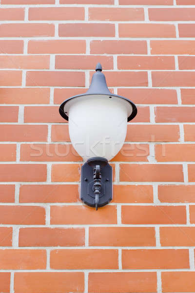 Vintage lantern on a wall. Stock photo © art9858