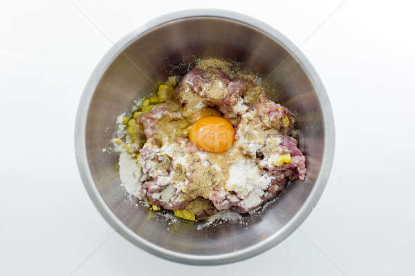 Minced meat,corns, eggs and flour in stainless steel bowl Stock photo © art9858