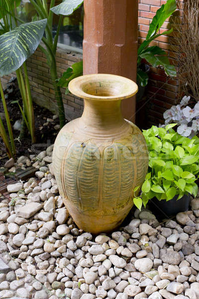Clay jar in the garden Stock photo © art9858
