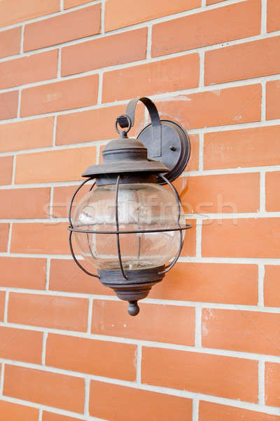 Vintage lantern on a wall. Stock photo © art9858