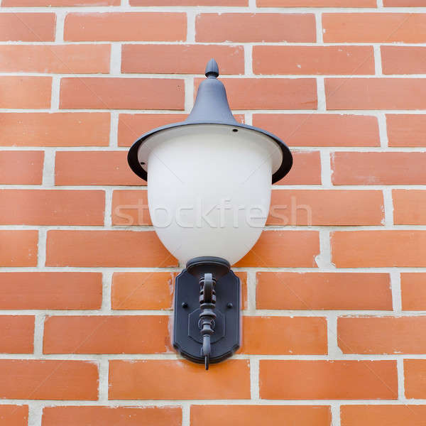 Vintage lantern on a wall. Stock photo © art9858
