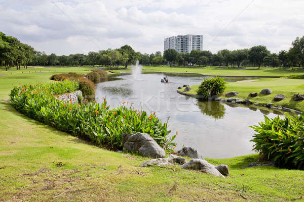 Wide view nice park with pond in sunny day Stock photo © art9858