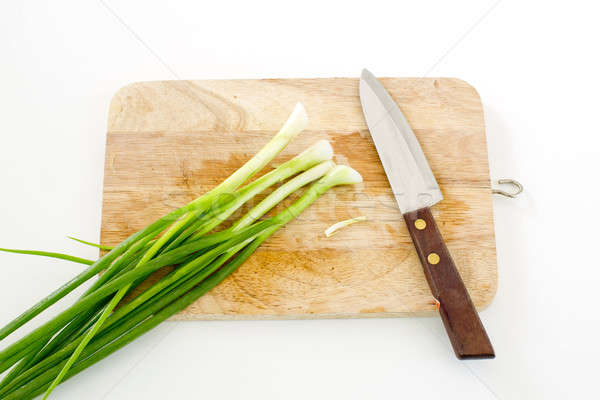 the spring onion on cutting board and knife Stock photo © art9858