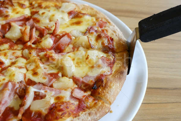 delicious hawaiian rustic style pizza made with fresh pineapples Stock photo © art9858