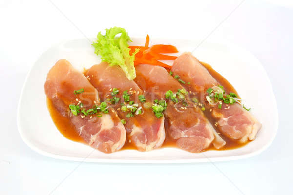 Fresh slices of chicken isoloate on white background ready to be Stock photo © art9858