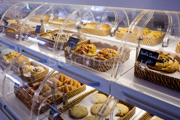 Variety of baked products in baskets with bread name and price o Stock photo © art9858