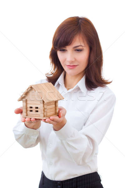 adult realtor with wooden toy house,it could be the tenant too. All isolated on white background. Stock photo © artfotodima
