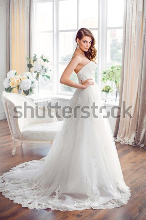Beautiful bride. Wedding hairstyle make-up luxury fashion dress concept Stock photo © artfotodima