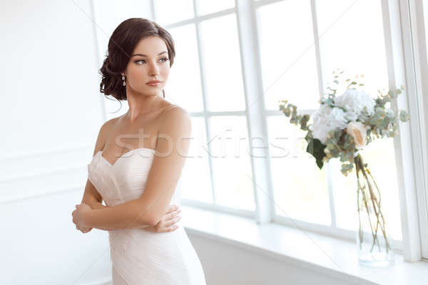 Lenyűgöző fiatal menyasszony ablak otthon gyönyörű Stock fotó © artfotodima