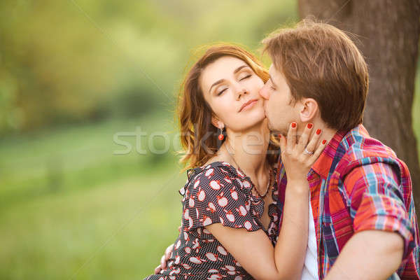 Loving couple on a meadow Stock photo © artfotodima