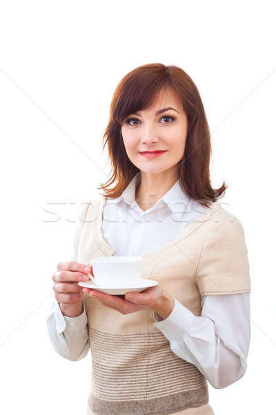 stock photo: woman enjoys her cup of tea on white background