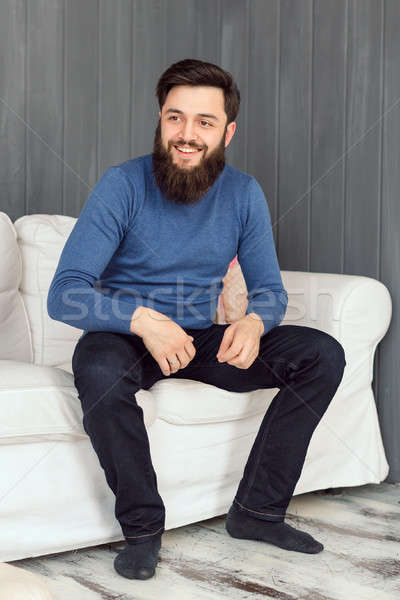Man relaxing in his front room Stock photo © artfotodima