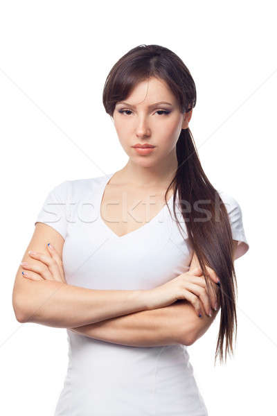 Portrait of upset woman against white background Stock photo © artfotodima