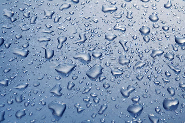 Vízcseppek eső cseppek fém felület égbolt víz Stock fotó © artfotodima