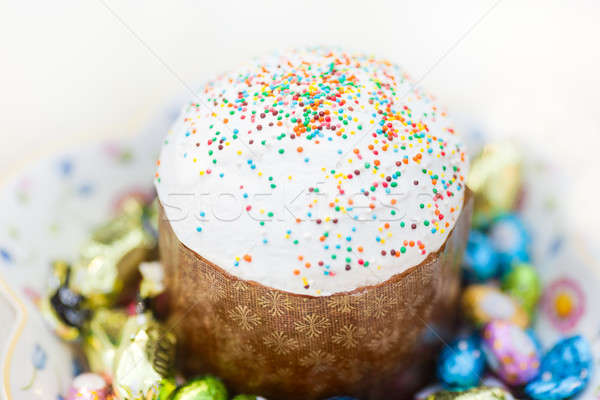 Fresh Easter cake with colorful decorative eggs Stock photo © artfotodima