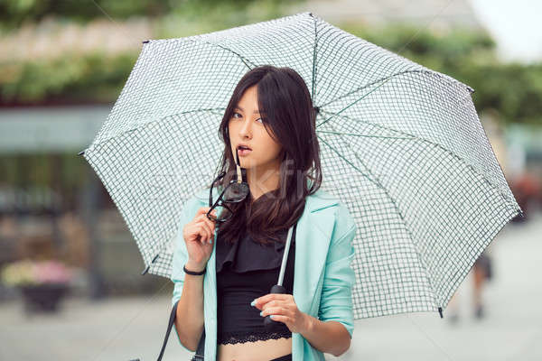 Asian girl city portrait. Stock photo © artfotodima