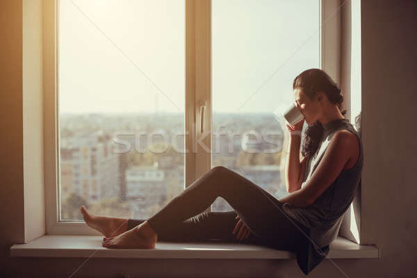 Girl resting and thinking at home Stock photo © artfotodima