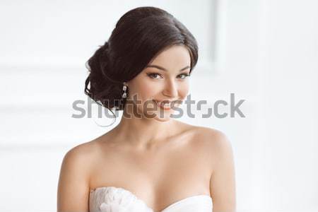 Beautiful young brunette bride - isolated on white background Stock photo © artfotodima