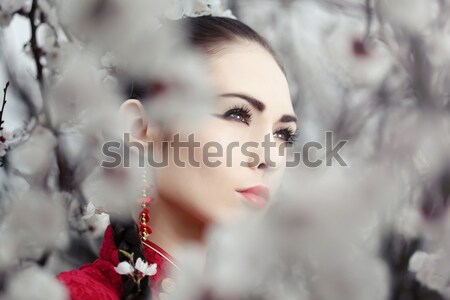 Gésa piros kimonó sakura vonzó ázsiai Stock fotó © artfotodima