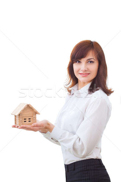 Real estate agent with house model Stock photo © artfotodima