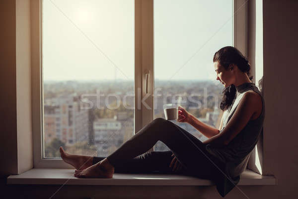 Girl resting and thinking at home Stock photo © artfotodima