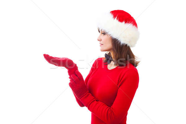 portrait of attractive caucasian adult woman isolated on white studio shot in santa's hat and red dr Stock photo © artfotodima