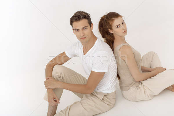 Yound couple indoors in studio. Stock photo © artfotodima