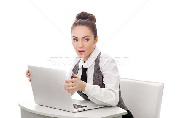 Woman hiding what she doing on laptop Stock photo © artfotodima