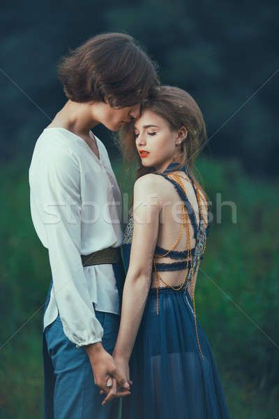 Young couple of elves in love outdoor Stock photo © artfotodima