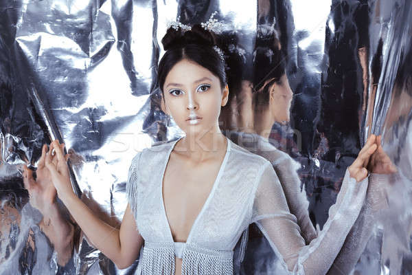 Shot of a futuristic young asian woman. Stock photo © artfotodima