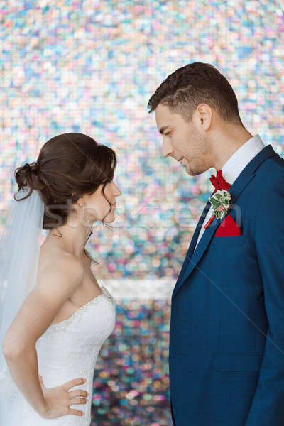 Bride and groom in very bright colored room Stock photo © artfotodima