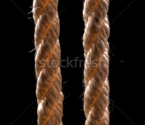 Stock photo: two ropes on a black background