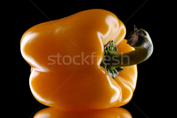 Stock photo: yellow sweet pepper on a black background