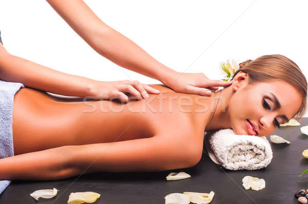 female during luxurious procedure of massage Stock photo © artfotoss