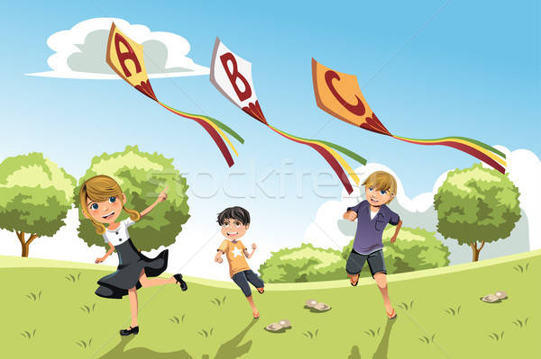 Kids with alphabet kites Stock photo © artisticco