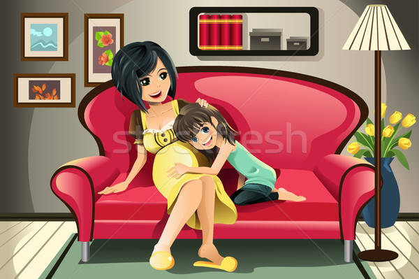 Gravidă mamă fiica camera de zi familie fată Imagine de stoc © artisticco