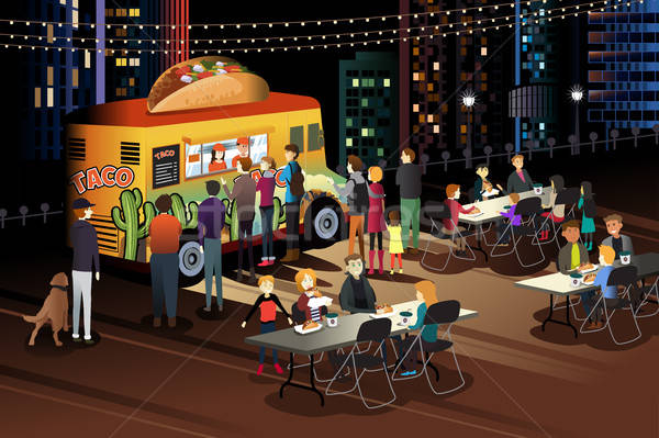 People Eating Taco at Taco Truck at Night Stock photo © artisticco