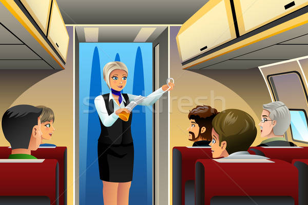 Stewardess veiligheid demonstratie af meisje Stockfoto © artisticco
