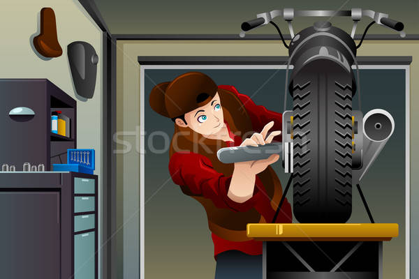 Man fixing a motorcycle  Stock photo © artisticco