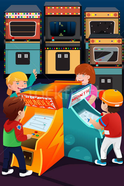 Kids playing arcade games Stock photo © artisticco