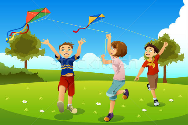 Kids Flying Kites in a Park Stock photo © artisticco