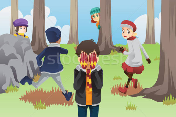 Kids playing hide and seek Stock photo © artisticco