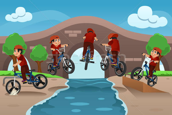 Gyerekek bicikli trükk sport gyermek híd Stock fotó © artisticco