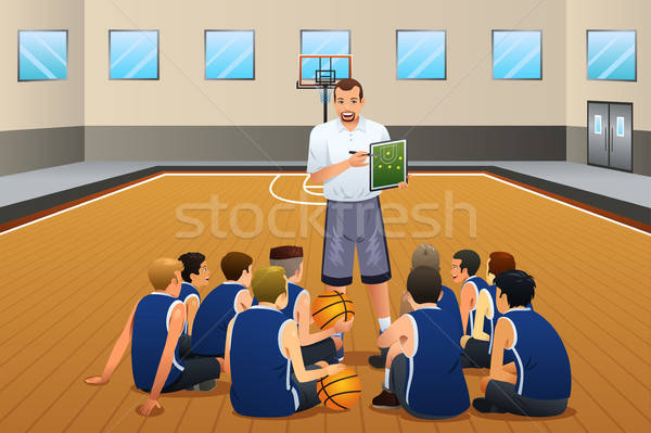 Baschet antrenor vorbesc jucatori tribunal copii Imagine de stoc © artisticco