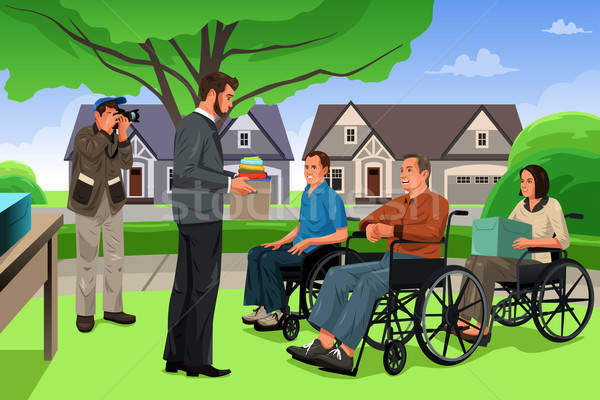 Stock photo: Man Giving Donation to the Disable People in an Event