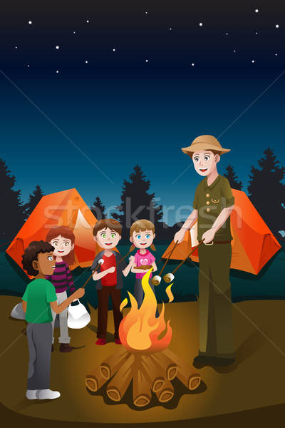 Dzieci obóz letni doradca ognisko człowiek dziewcząt Zdjęcia stock © artisticco