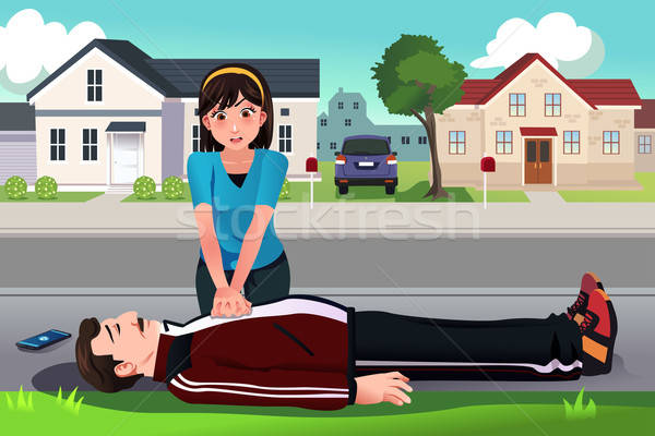 Teenager giving a CPR to a middle aged man Stock photo © artisticco