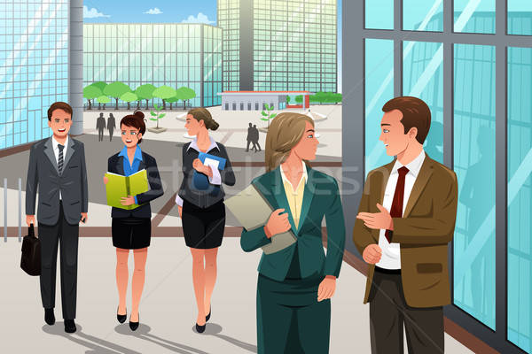 Business people walking and talking outside their office Stock photo © artisticco