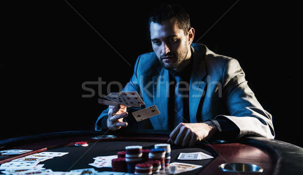 Stock photo: Emotional high stakes poker player