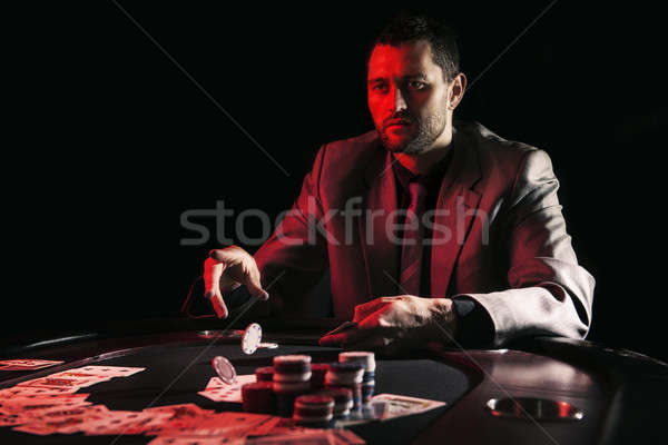 Emotional high stakes poker player Stock photo © artistrobd